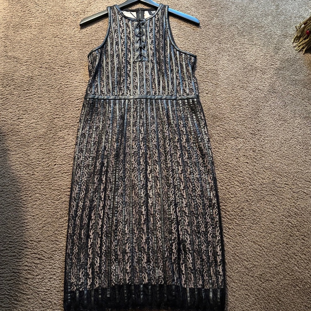 New with tags leather and lace dress from Worth. Size 4 NO BUNDLE